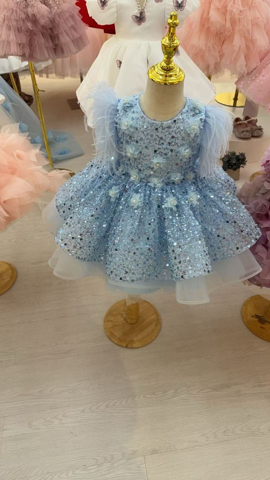 Girls Sky Blue Sequin Feather Sleeve Ball Gown